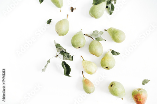Minimalistic pears fruit and leaves pattern on white background. Flat lay, top view.
