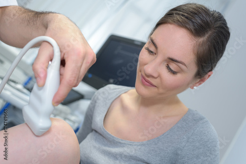 ultrasound echo on the knee of a woman photo