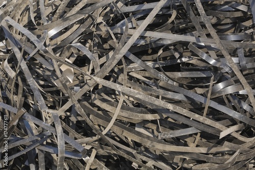 Pile of discarded metal straps at a scrap metal recycling centre, Quebec, Canada, North America