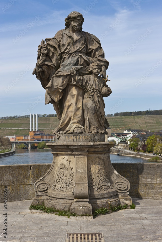 Alte Mainbruecke Main river bridge with statue of St. Josephus, Wuerzburg, Bavaria, Germany, Europe