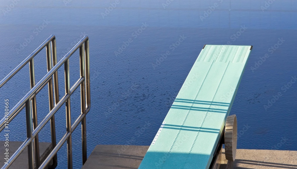 Fototapeta premium Diving board into a swimming pool
