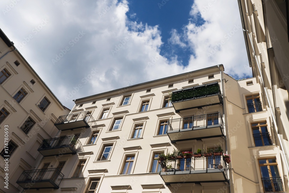 Obraz premium Renovated inner courtyard house facades in the Prenzlauer Berg district of Berlin, Germany, Europe