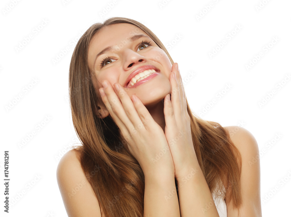 Attractive young woman smile and looking up Attractive young woman smile and looking up