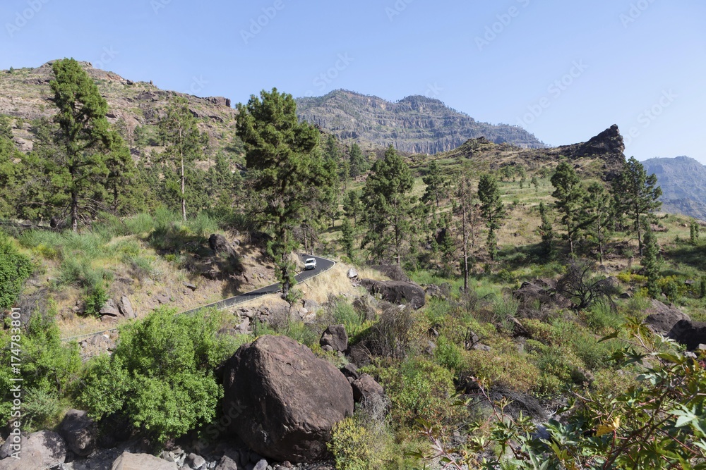 Mountain chain and a country road, El Pie de la Cuesta, Roque Bentaiga, Gran Canaria, Canary Islands, Spain, Europe, PublicGround, Europe Mountain chain and a country road, El Pie de la Cuesta, Roque Bentaiga, Gran Canaria, Canary Islands, Spain, Europe, PublicGround, Europe