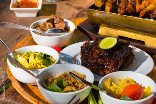 Obraz na płótnie Traditional balinese sea food with satay and curry in Bali, Indo w salonie