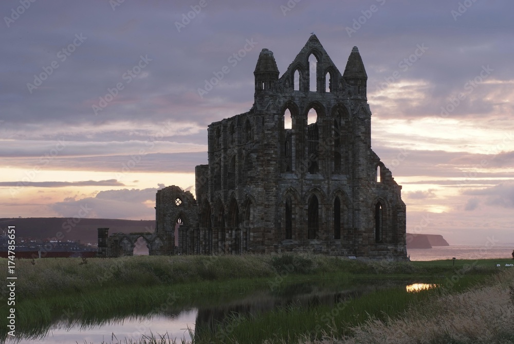 Monastery ruins in sunset light, Whitby Abbey, North Sea at back, Yorkshire, Great Britain, Europe