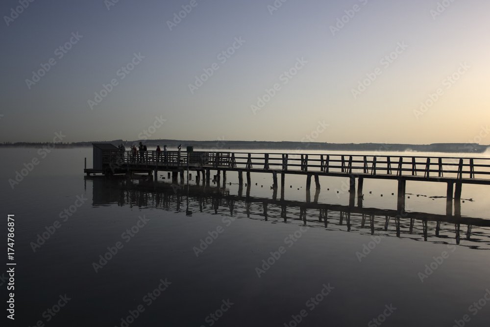 Federseesteg jetty, lake Federsee, reflection, morning mood, Biberach, Upper Swabia, Baden-Wuerttemberg, Germany, Europe