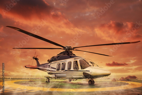 helicopter parking landing on offshore platform, Helicopter transfer crews or passenger to work in offshore oil and gas industry, air transportation for support passenger, ground service in airport. photo
