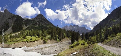 Dried-up river bed of the Laliderer stream in Laliderertal Valley, view of the Lalidererwaende Cliffs, Karwendel, Tyrol, Austria, Europe photo