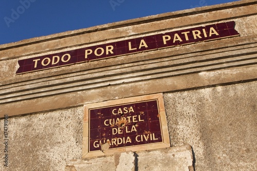 Ruins of an old guard house of the Guardia Civil with the Spanish words for "All for the Fatherland", Andalusia, Spain, Europe