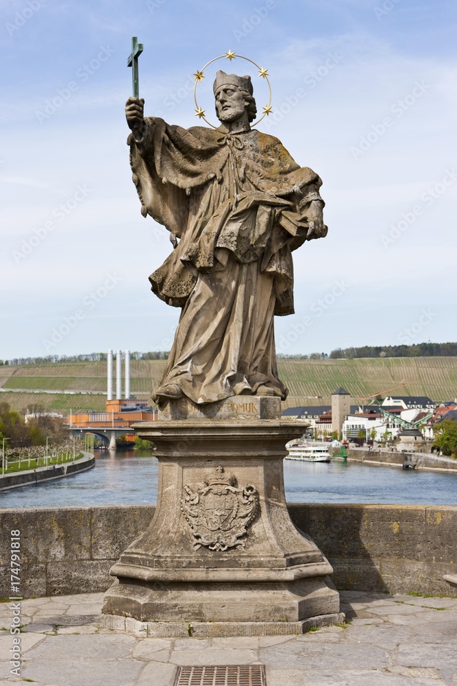 Alte Mainbruecke Main river bridge with statue of St. John of Nepomuk, Wuerzburg, Bavaria, Germany, Europe