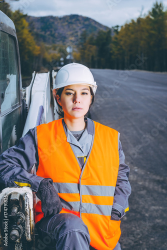 female worker road construction photo