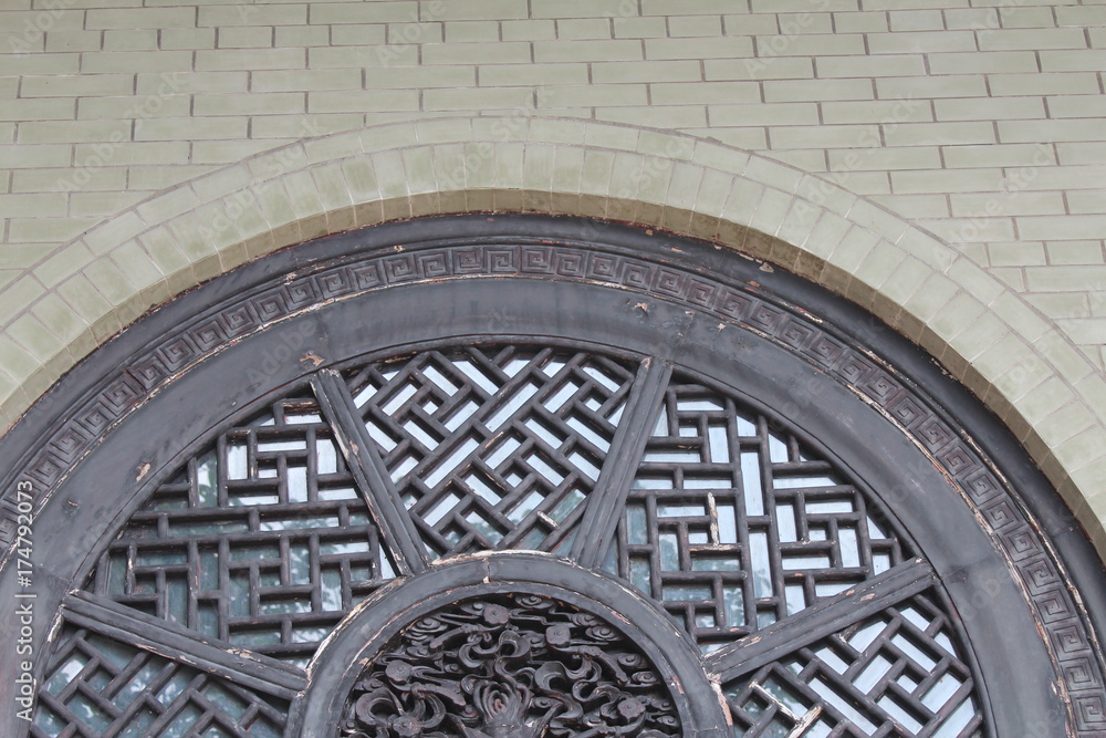 Circle Window in a Buddhist Temple in Guangdong China Asia