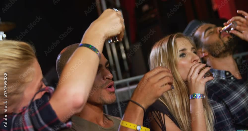 Friends drinking tequila shots Friends drinking tequila shots