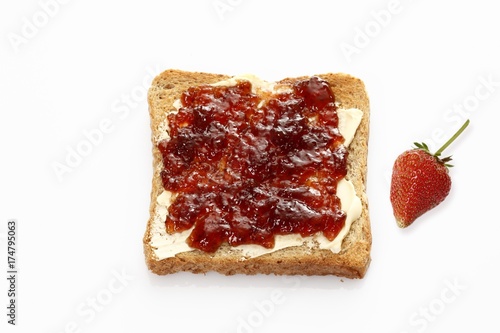 Slice of toast with strawberry jam
