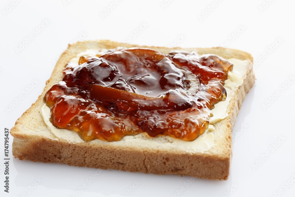 Two slices of toast, toasted slices of bread with homemade marmalade Two slices of toast, toasted slices of bread with homemade marmalade