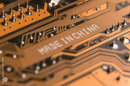 Photography Macro image of a motherboard with the inscription Made in China