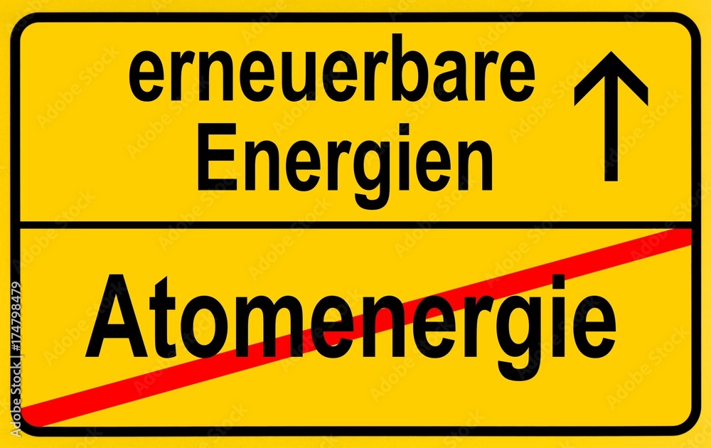 Symbolic image in the form of a town sign, in German, exit from atomic energy, entrance into renewable energy sources Symbolic image in the form of a town sign, in German, exit from atomic energy, entrance into renewable energy sources