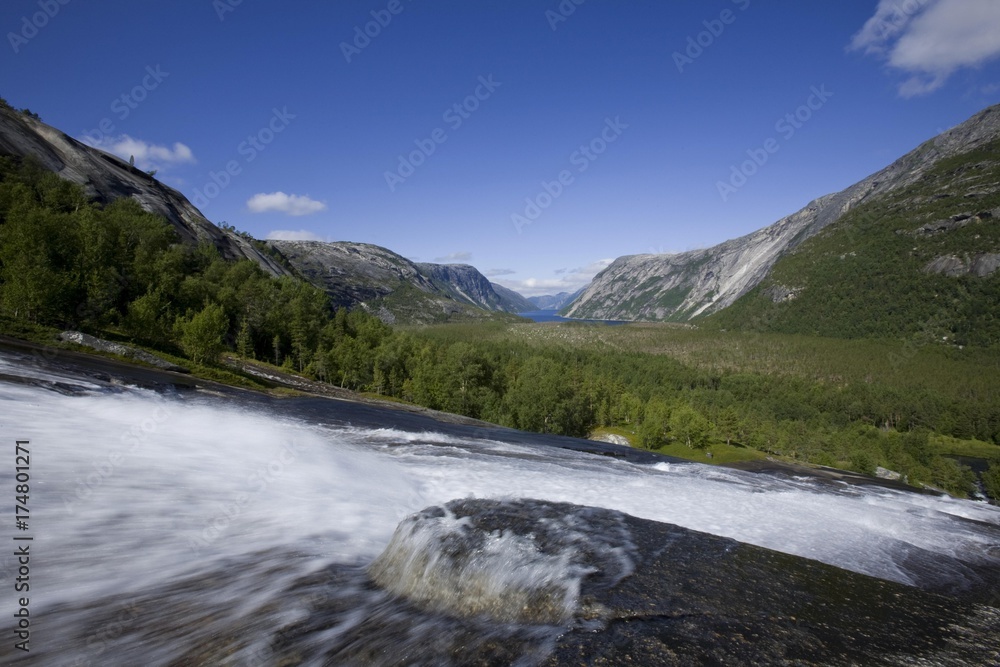 River flowing over granite rocks at Hellmobotn, Hellmofjorden, Norway, Scandinavia, Europe