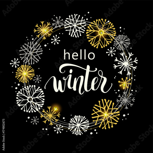 Winter lettering design on snow background with hand drawn snowflake frame.