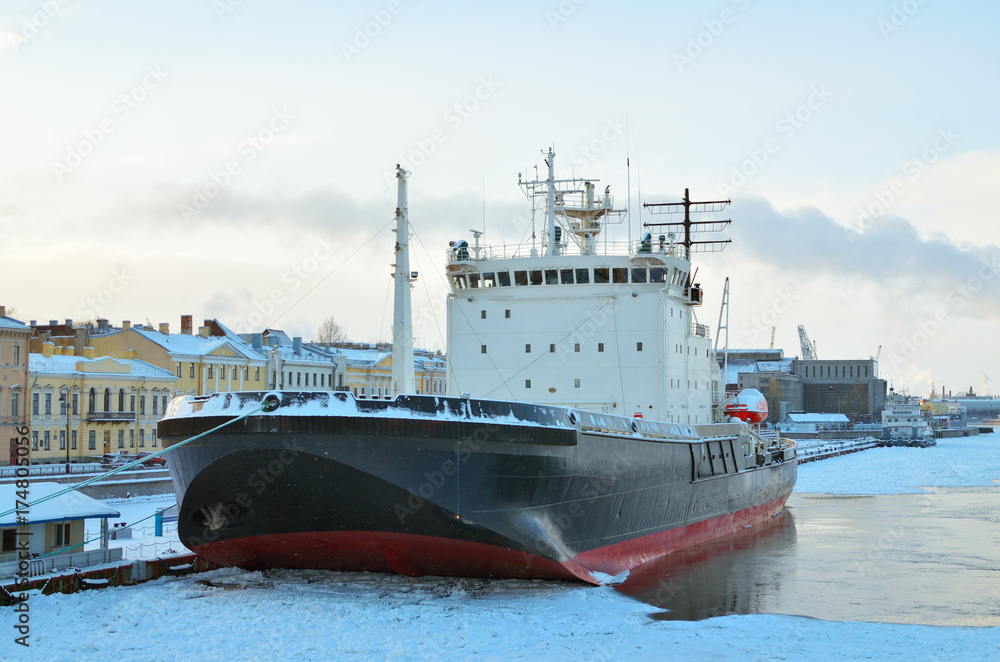 A great icebreaker is moored.