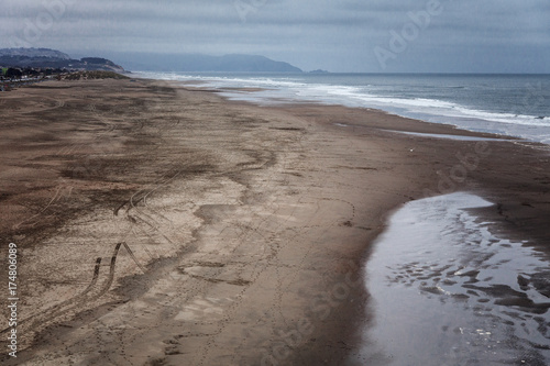 Wallpaper Mural large deserted beach, beautiful view of the ocean, large stones Torontodigital.ca