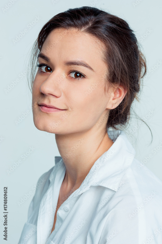 The young woman's portrait with happy emotions The young woman's portrait with happy emotions