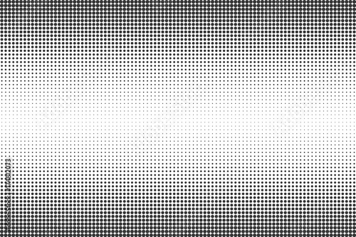 Abstract black and white dots background. Comic pop art style. Light effect. Gradient background with dots.