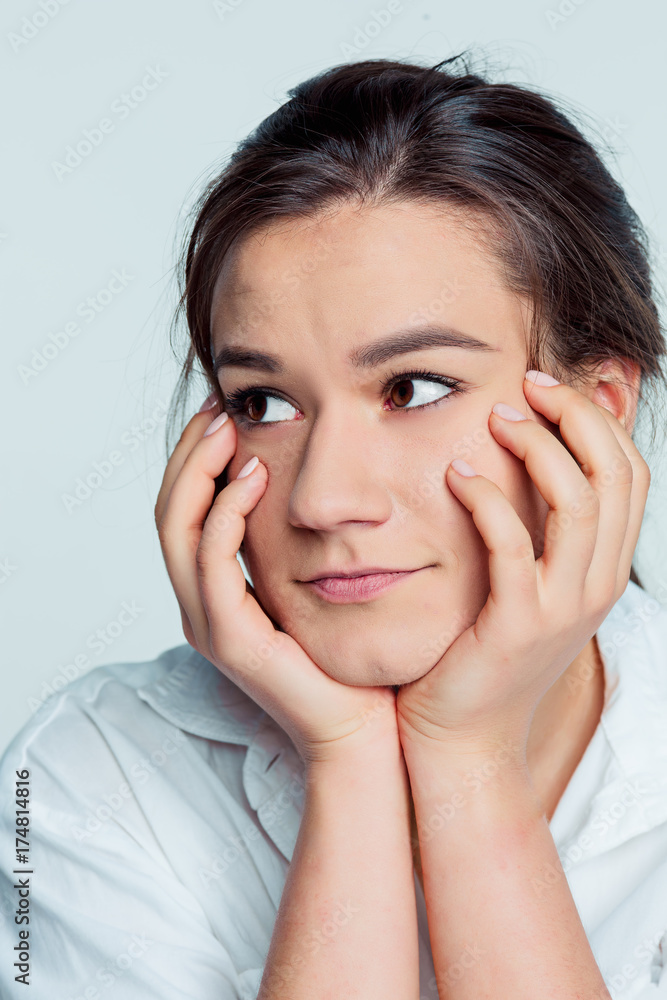 The young woman's portrait with thoughtful emotions The young woman's portrait with thoughtful emotions