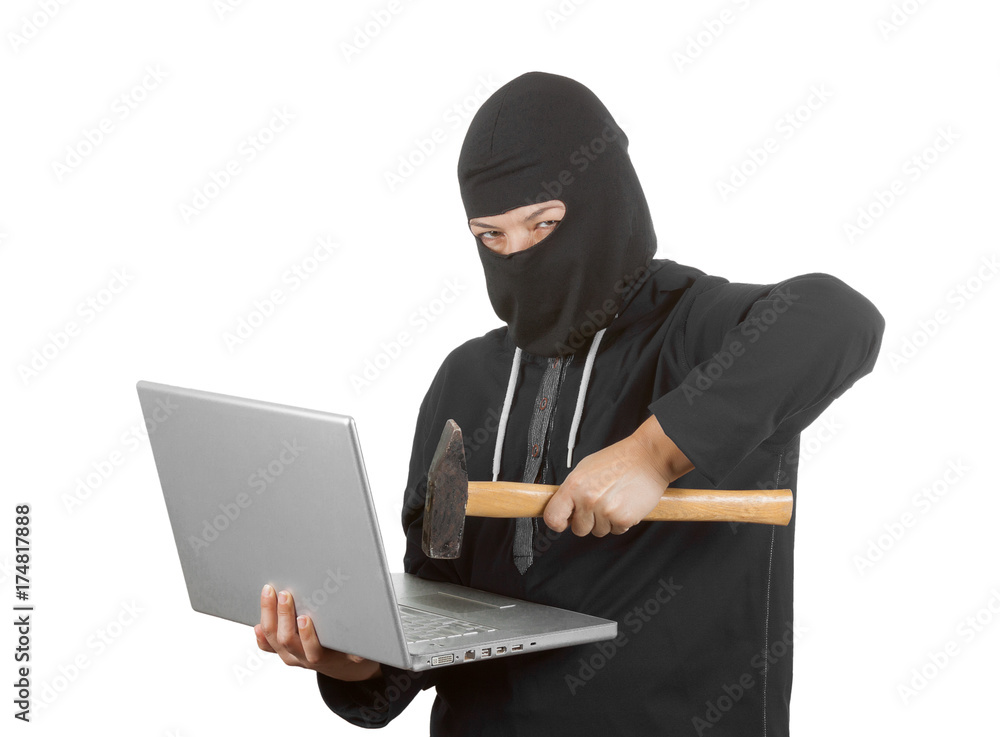 Criminal Woman Hacker Wearing Hood On in Black Clothes and Balaclava Destroy Laptop with Hammer Criminal Woman Hacker Wearing Hood On in Black Clothes and Balaclava Destroy Laptop with Hammer