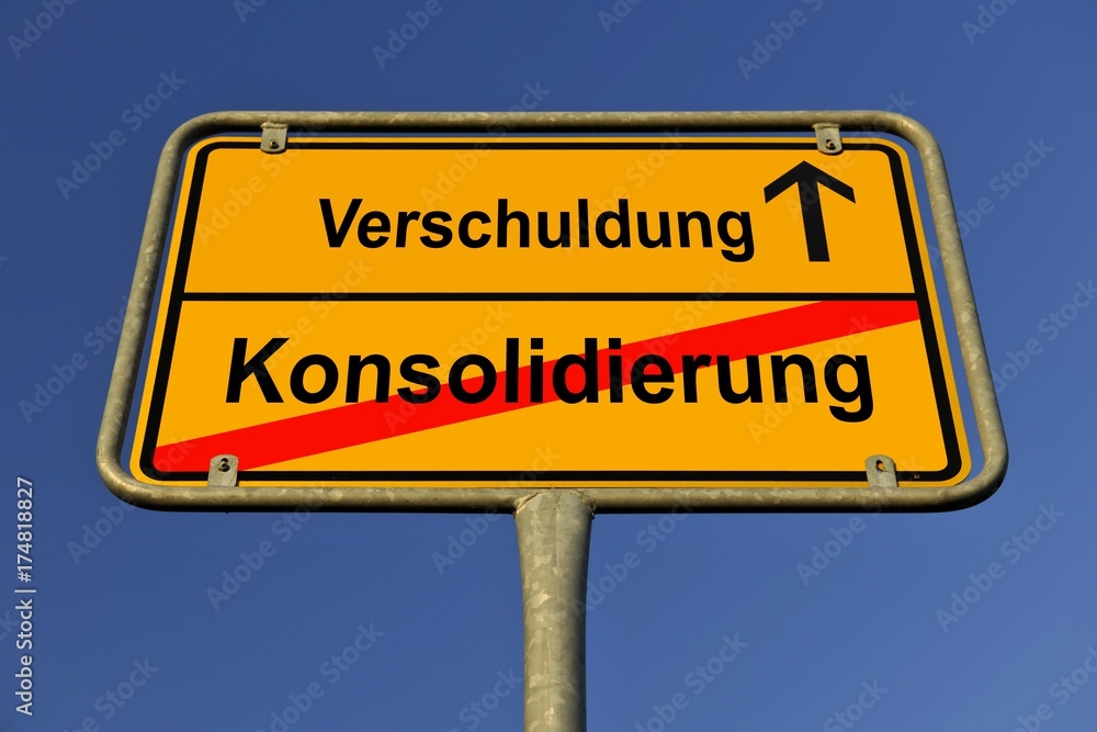 City limit sign, symbolic image for the way from a Konsolidierung to Schulden, German for going from a consolidation to having debts City limit sign, symbolic image for the way from a Konsolidierung to Schulden, German for going from a consolidation to having debts