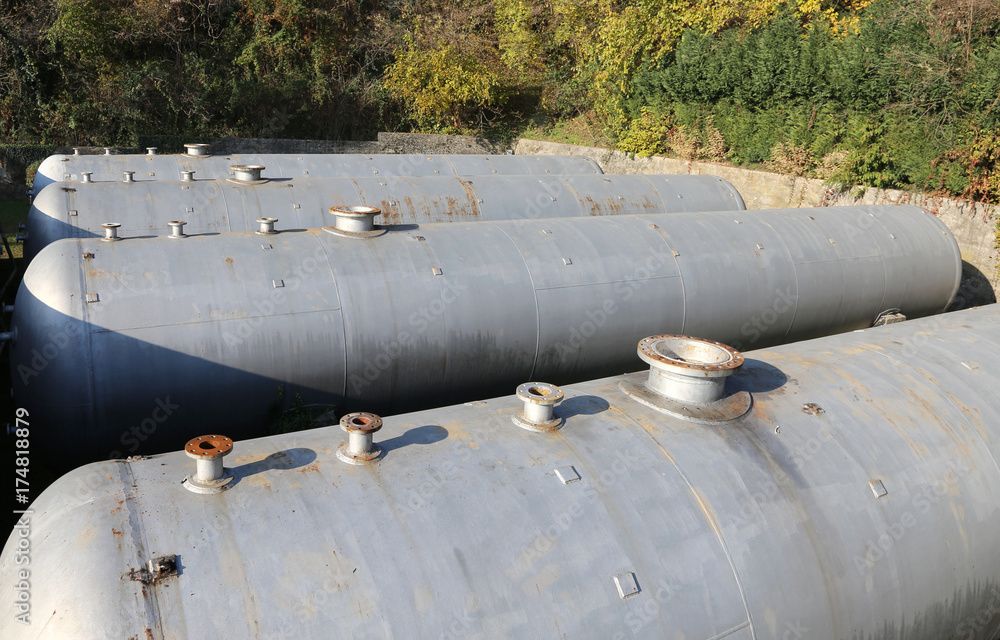Huge gas storage tanks in an industrial area. Huge gas storage tanks in an industrial area.