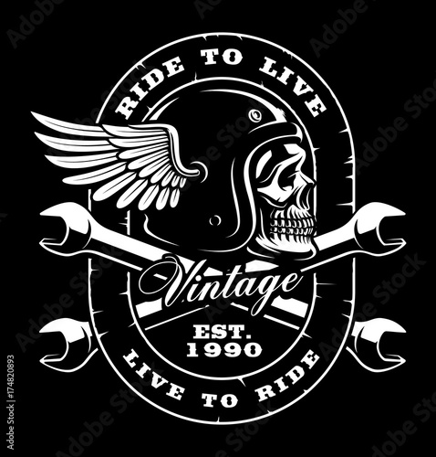 skull with crossed wrenches on dark background
