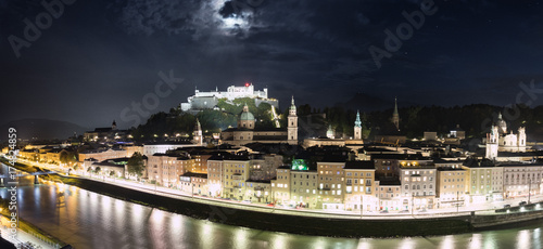 Salzburger Altstadt Panorama bei Nacht: Festung Hohensalzburg, Altstadt und Dom. Ausblick vom Kapuzinerberg photo