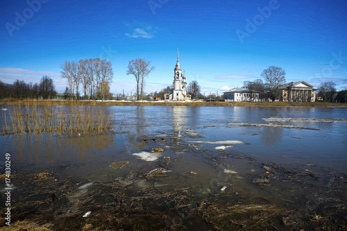 Church on the river bank © kichigin19