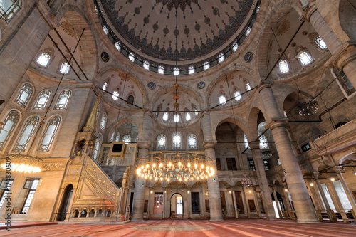 Photography Interior low angle shot of Eyup Sultan Mosque situated in the Eyup district of Istanbul, Turkey, outside the city walls near the Golden Horn