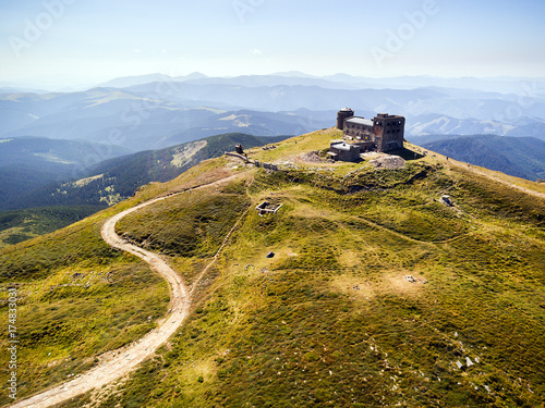old abandoned observatory on mount Pip Ivan in Carpathian mountains, Ukraine photo