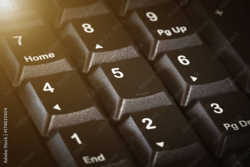 Closeup black number button on the keyboard of laptop Closeup black number button on the keyboard of laptop