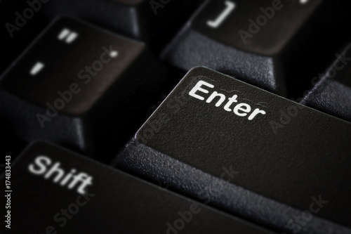 Enter button on black computer keyboard; Macro photo