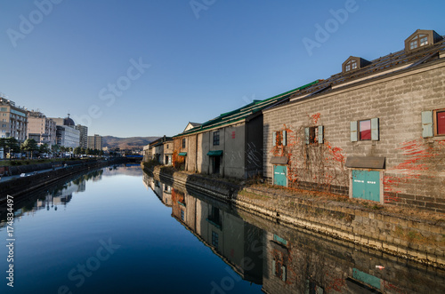 Otaru, Japan- 13 NOV 2015: Otaru Canal was once a central part of the city's busy port in the first half of the 20th century. This historic canal has a romantic, old-timey ambiance.