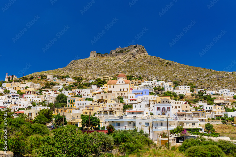 Scenic view of Panteli village with a castle on a hill, Leros island, Greece