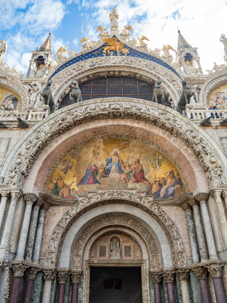 View at Cathedral of San Marco (San Marco basilica) in Venice with blue sky, Italy.