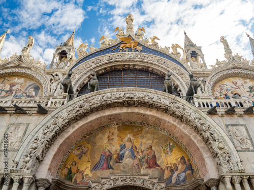 View at Cathedral of San Marco (San Marco basilica) in Venice with blue sky, Italy. photo