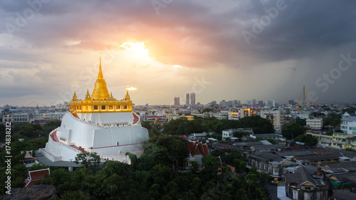 Beautiful Golden Mount Temple Fair, Golden Mount Temple in Bangkok at dusk,  The most travel Landmark of Bangkok Thailand during sunset. © nakcrub