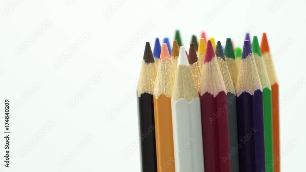 Rotate colour pencils isolated on white background close up macro shot of color pencil pile pencil nibs. Rotate colour pencils isolated on white background close up macro shot of color pencil pile pencil nibs.