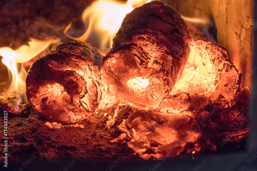 Glut und Feuer im Kachelofen Stock Photo | Adobe Stock