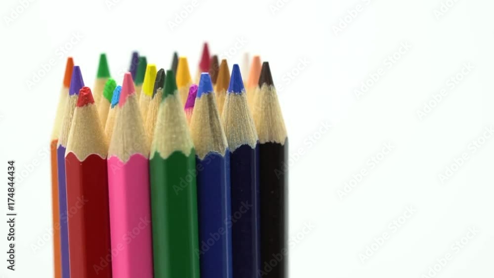 Rotate colour pencils isolated on white background close up macro shot of color pencil pile pencil nibs. Rotate colour pencils isolated on white background close up macro shot of color pencil pile pencil nibs.