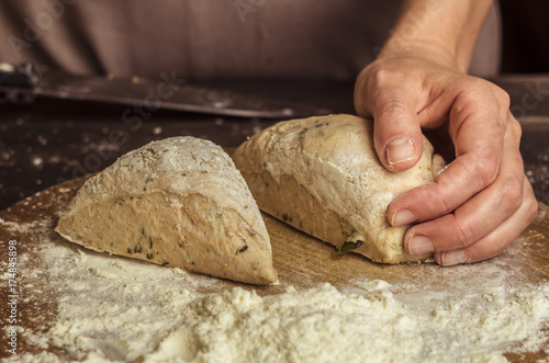 The chef's hands that knead the dough.