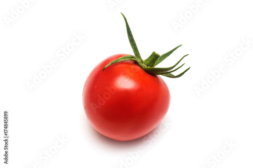 One fresh tomato isolated on white background. Tasty and healthy food. Flat lay, top view