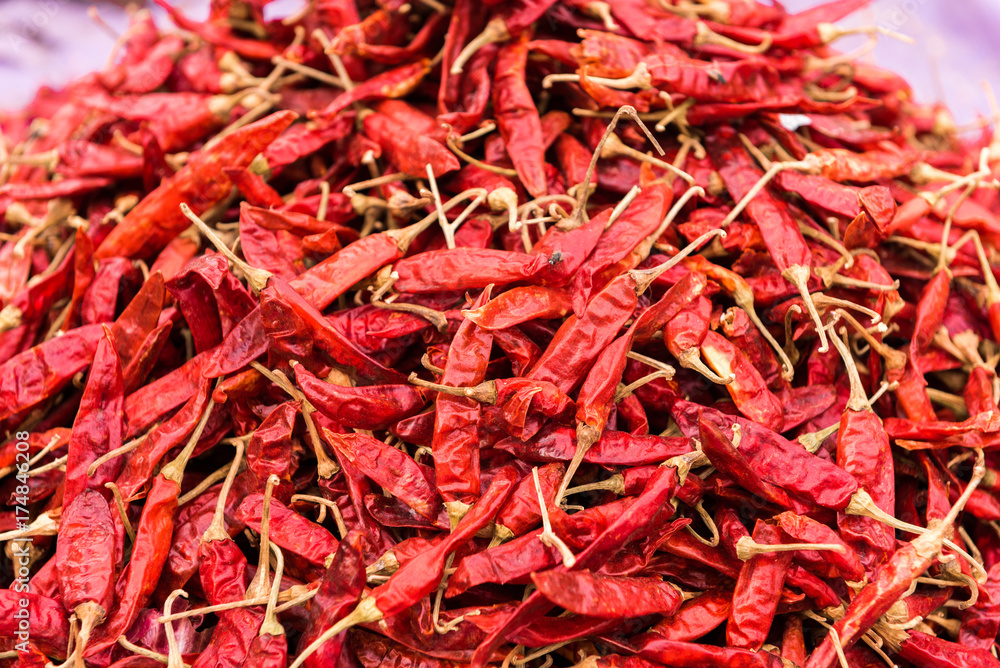 Red paprica in traditional vegetable market in India, Puttaparthi, Andhra Pradesh. Ñlose-up. Red paprica in traditional vegetable market in India, Puttaparthi, Andhra Pradesh. Ñlose-up.